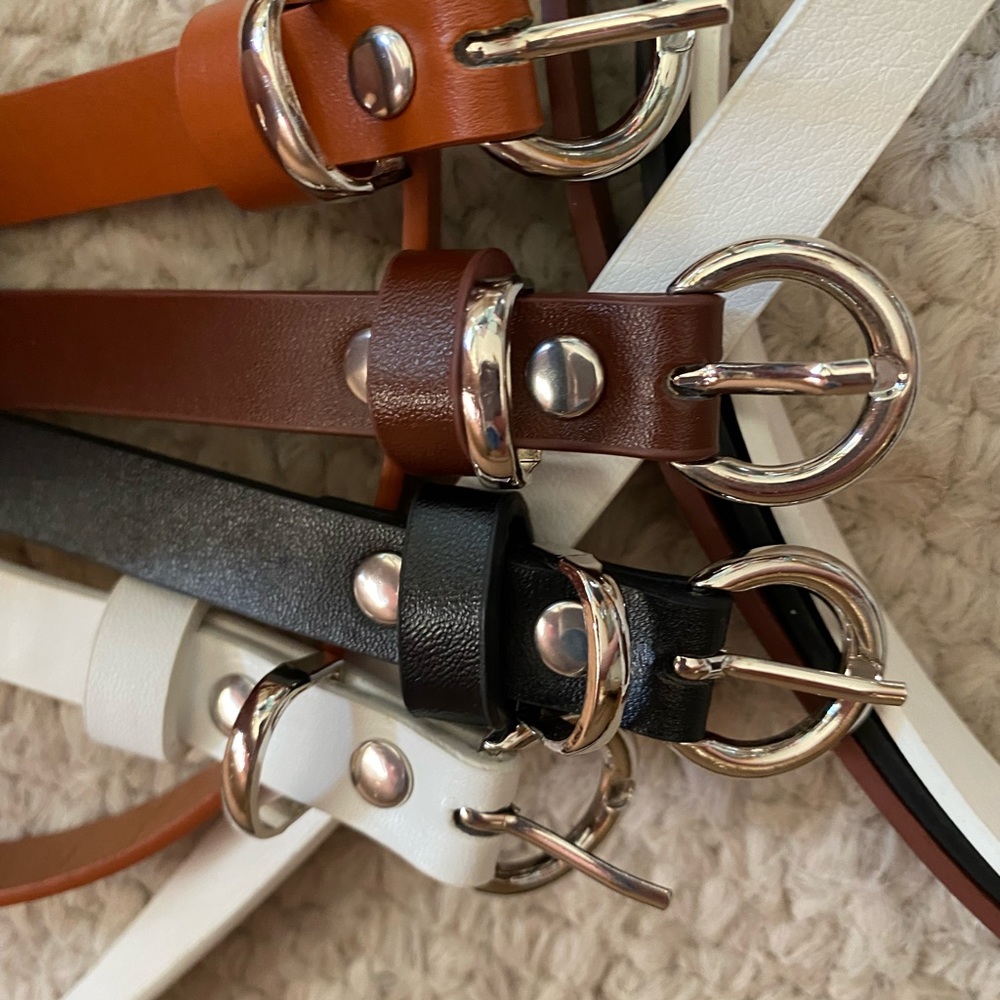 4 Women’s 1/2” wide Leather belts. NEW Adjustable